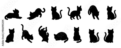 Black silhouettes of cartoon cats in different poses. Minimal vector animal clipart collection