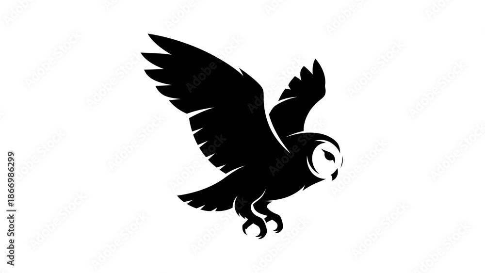 Obraz premium Majestic barn owl in flight with wings spread wide.