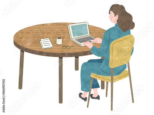 テーブルでくつろいで仕事をする女性