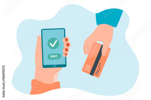 Hands holding credit card and mobile phone with banking app