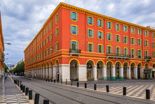Ornate colorful buildings in Place Massena in Nice, French Riviera, France