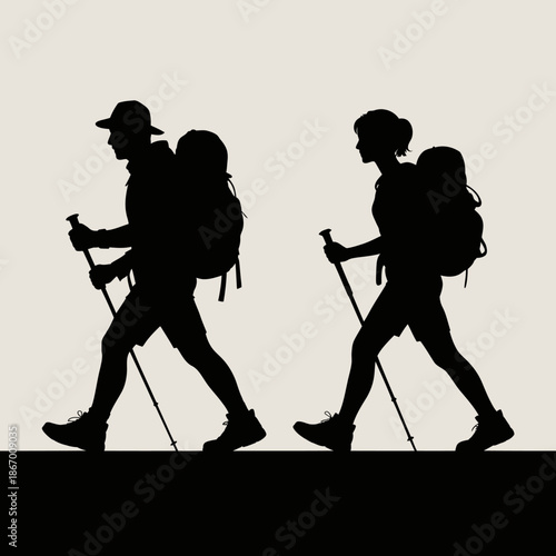 Two hikers walking with trekking poles and backpacks.