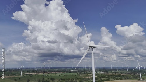 Wind turbines at green mountain hill clean sustainable electricity power, Green generator cloudy blue sky