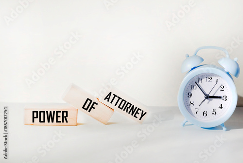 Foto Wooden blocks with the inscription Power of Attorney on a white background