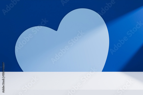 Blue heart cutout on dark blue product background.