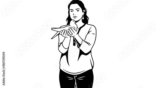 Woman gently holding a white dove in her hands peacefully