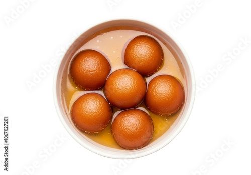 gulab jamun dessert in syrup bowl top view
