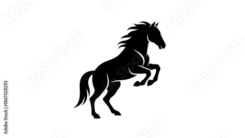 Silhouette of a powerful horse rearing up majestically.