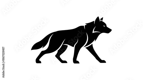 Silhouette of a powerful wolf walking with determination.
