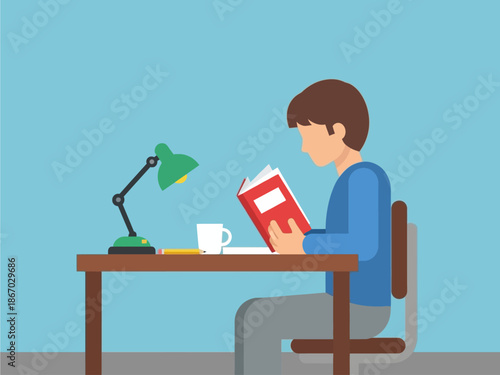 A person sitting at a desk and reading a book with a desk lamp illuminating the pages