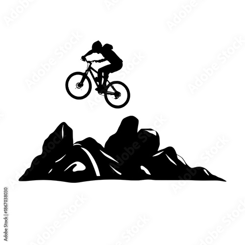 Mountain Biker Jumping Over Rocks Silhouette