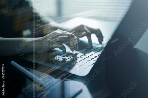 Konstfotografi software, development, programmer, developer, A programmer typing on a laptop with code reflections, representing software development, debugging, system building, and modern digital engineering