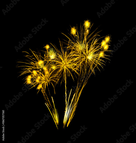 Golden firework sparkling on black background for celebration and anniversary