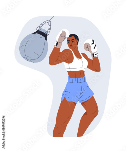 Young female boxer training with speed bag, workout. Woman athlete in boxing ...