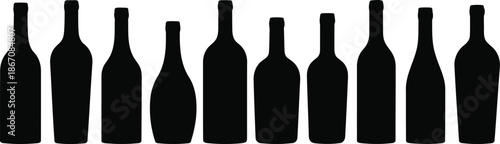 A horizontal row of different black silhouette wine and spirit bottles against a clean white backdrop