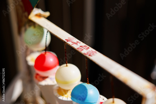 Miniature ice cream bucket toy decor at a 1980s Hong Kong stall with old school filter