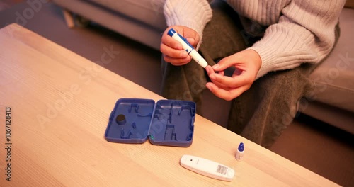 Diabetic patient monitoring blood glucose level at home