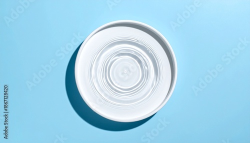 Ceramic Shapes Arranged in Abstract Composition on Blue Background