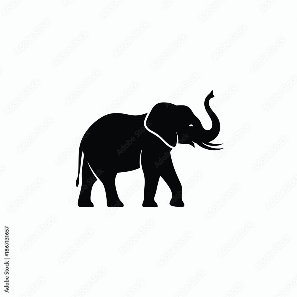 Obraz premium Elegant Silhouette of an Elephant with Trunk Raised.