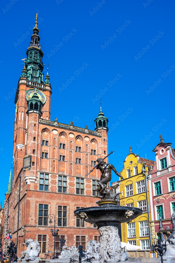 Obraz premium Poland, Gdansk, Famous Neptune fountain and historic street. Famous travel destination.