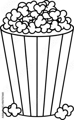 Popcorn in a striped container, snack food with popped kernels overflowing and scattered