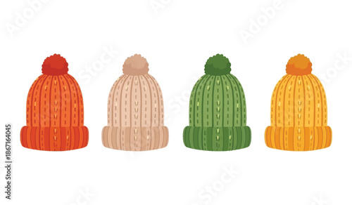 Four colorful knit hats with pom poms on top in a row