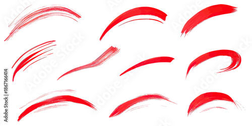 Set of vibrant red brush stroke underlines and swoosh accents with varying thickness and texture for artistic highlights and graphic design elements in vector format