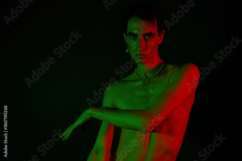 Photography Stylish man posed in dramatic lighting showcasing modern fashion and artistic ex