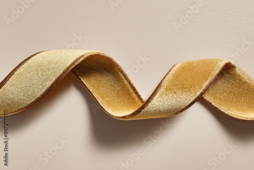 Golden satin ribbon flowing