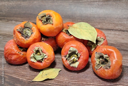 persimmons, orange cherries, autumn fruits, fruits full of vitamins, ripe fruits