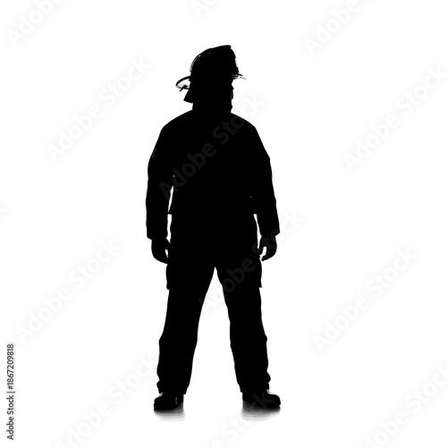 Silhouette of a firefighter in full gear standing tall.