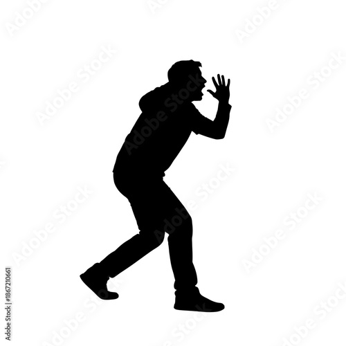 Silhouette of a man yelling with his hands raised.
