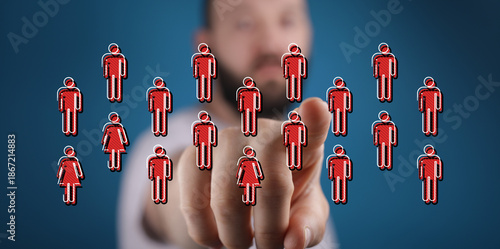 Hand pointing at a group of...