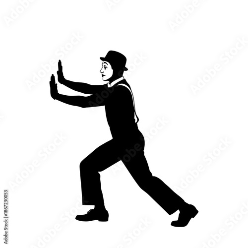 Silhouette of a mime artist pushing against an invisible wall.