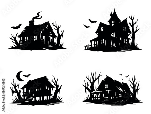Spooky silhouette of haunted houses with glowing windows at night