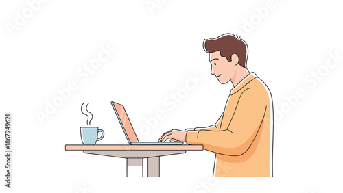 Young man smiling while working or studying on his laptop computer at a desk, with a steaming cup of hot coffee or tea next to him.