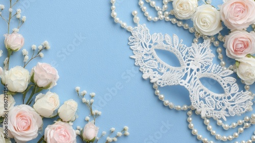 Elegant white lace masquerade mask with delicate pink and white roses rests on a pastel blue background