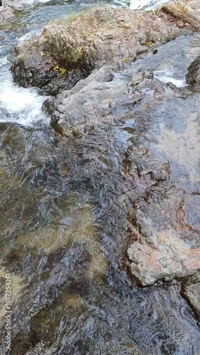 Natural Abstract River Stream Water Flowing Over Rough Stone Rock Texture Creates Peaceful Refreshing Feeling Wild Outdoor Landscape With Splashing Clear Wet Surface Background Wallpaper Environment