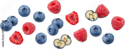 Assortment of fresh ripe blueberries and vibrant raspberries some whole and some halved scattered in a random pattern blueberry raspberry berry fruit healthy natural sweet transparent background