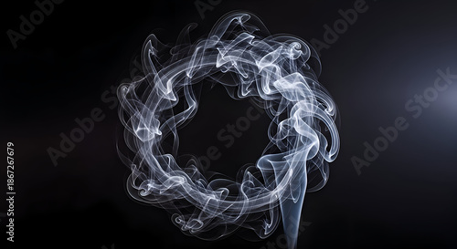 Ethereal smoke wreath on dark background with glowing effect