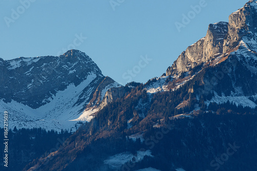 Scenic view of snowy mounta...