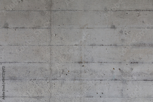 Textured concrete wall back...