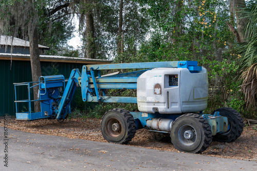 A man lift machine in a forest