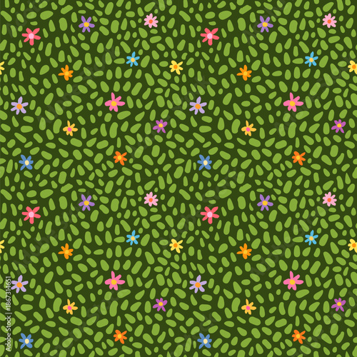 Colorful flowers on abstract vector green grass seamless pattern, cute design for fabric, carpets and kids room decor