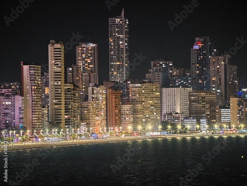Fotografie vivid oceanfront skyline illuminated with radiant towers and welcoming shoreline