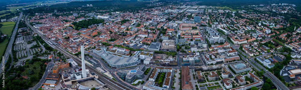 Fototapeta premium Aerial panoramic view of the city Erlangen in Germany, Bavaria on a sunny spring noon.
