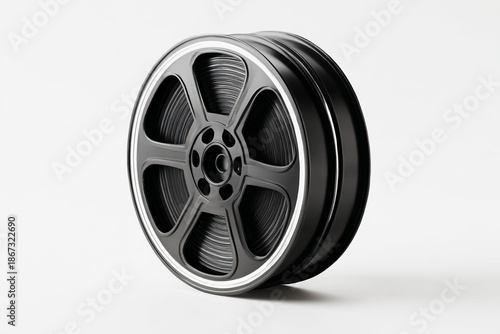 Black Film Reel on White Background Representing Cinema – Movie and Entertainment Concept.