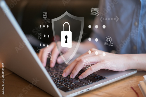 Businessman online digital remote working laptop computer with shield padlock lock password, cybersecurity and data information protection access firewall concept