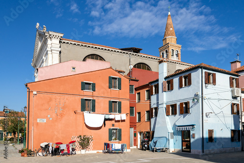 Colorful residential houses with hanging laundry and everyday life in Pellestrina, Venice, Italy