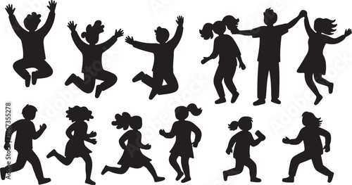 Silhouettes of happy children playing and jumping together outdoors